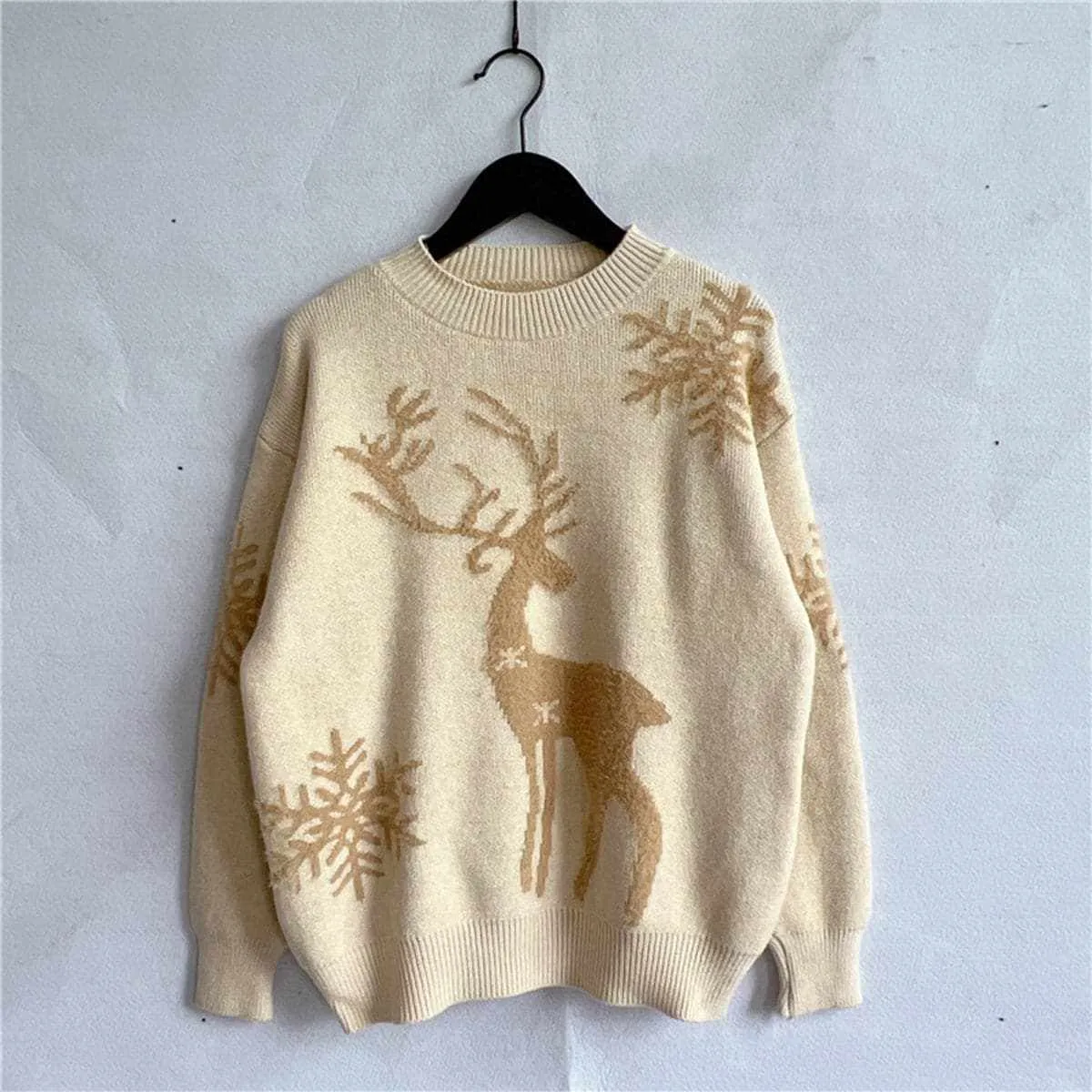 Cozy reindeer knit sweater for winter