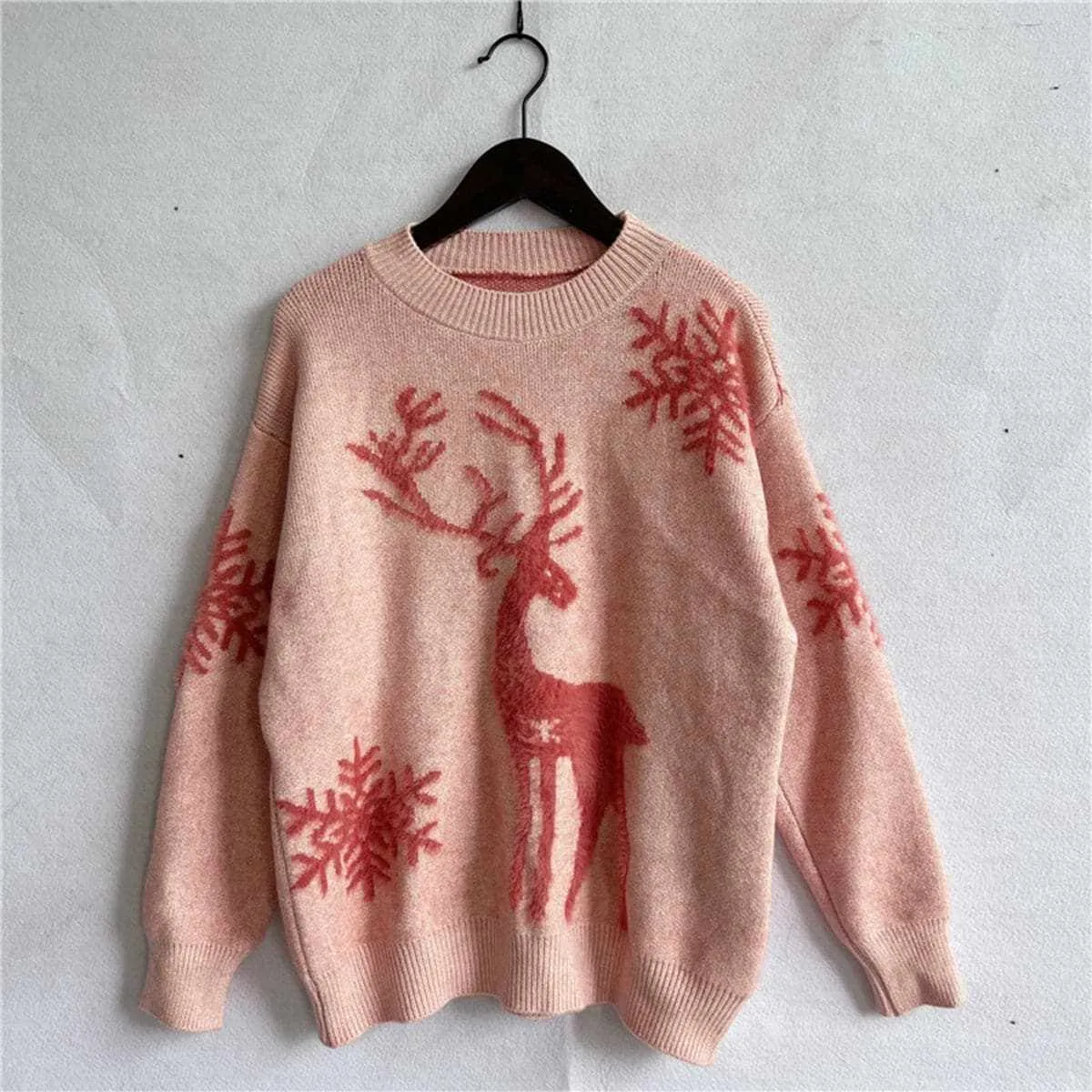 Cozy reindeer knit sweater for winter