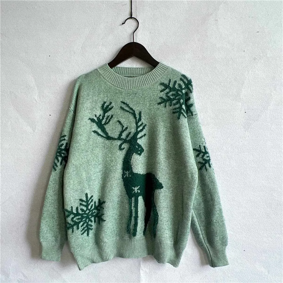 Cozy reindeer knit sweater for winter