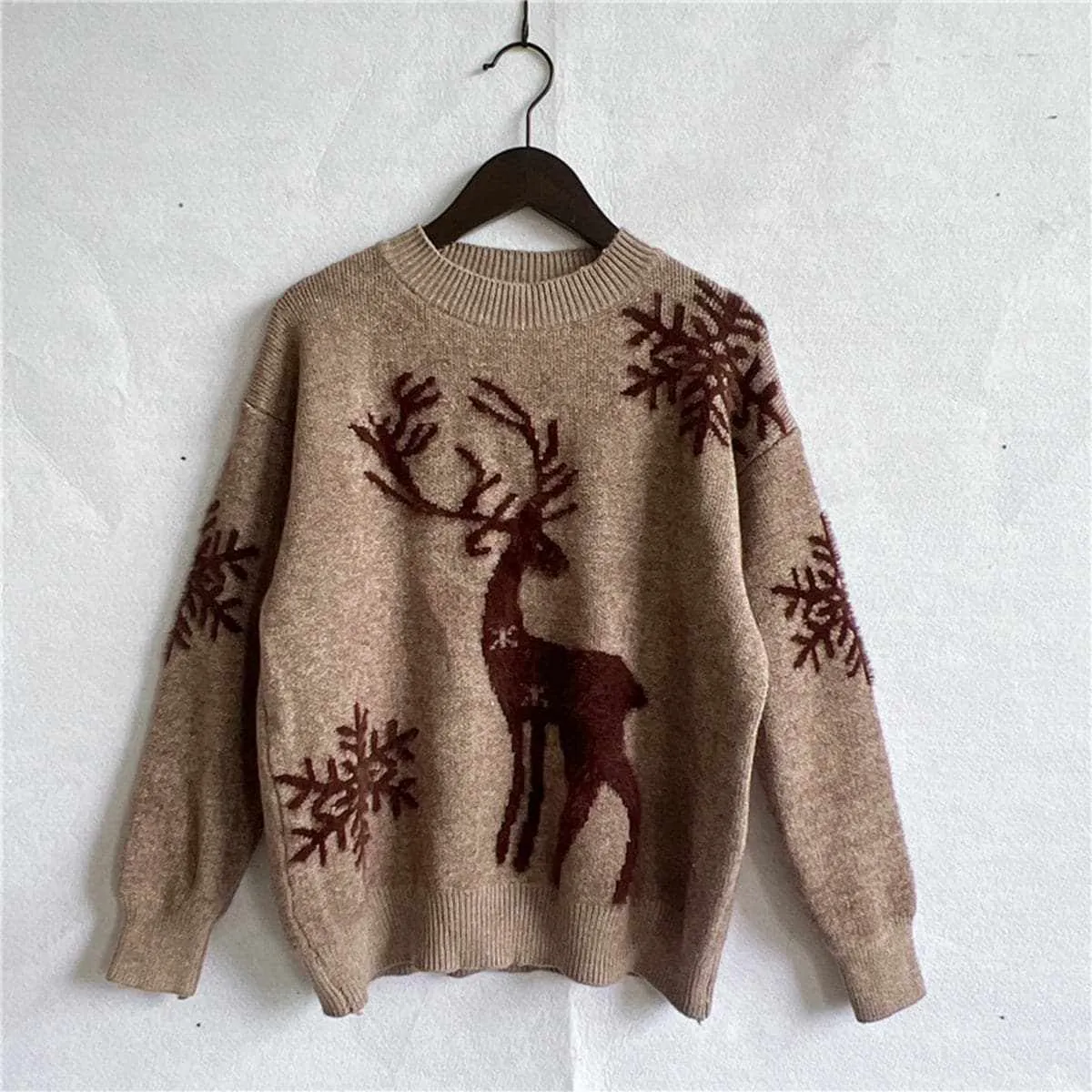 Cozy reindeer knit sweater for winter